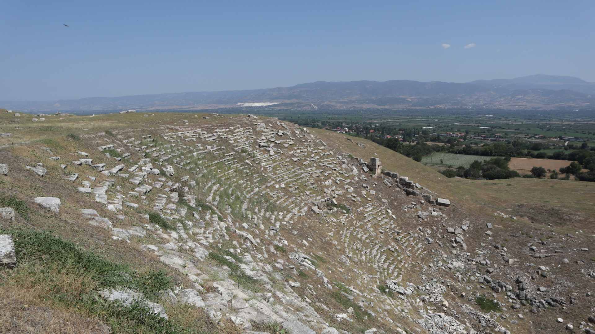 The northern theater of Laodicea. The small white spot behind it is the spectacular Pamukkale, 11 km further