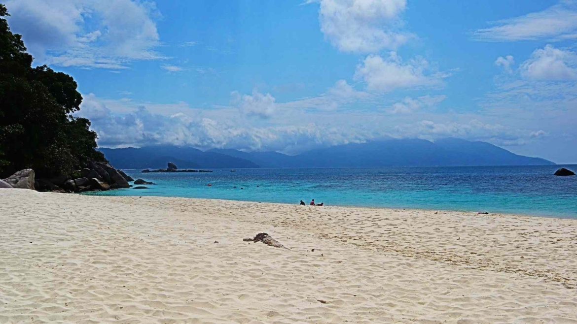 Tioman Island- clear seawater, white sand and blue sky