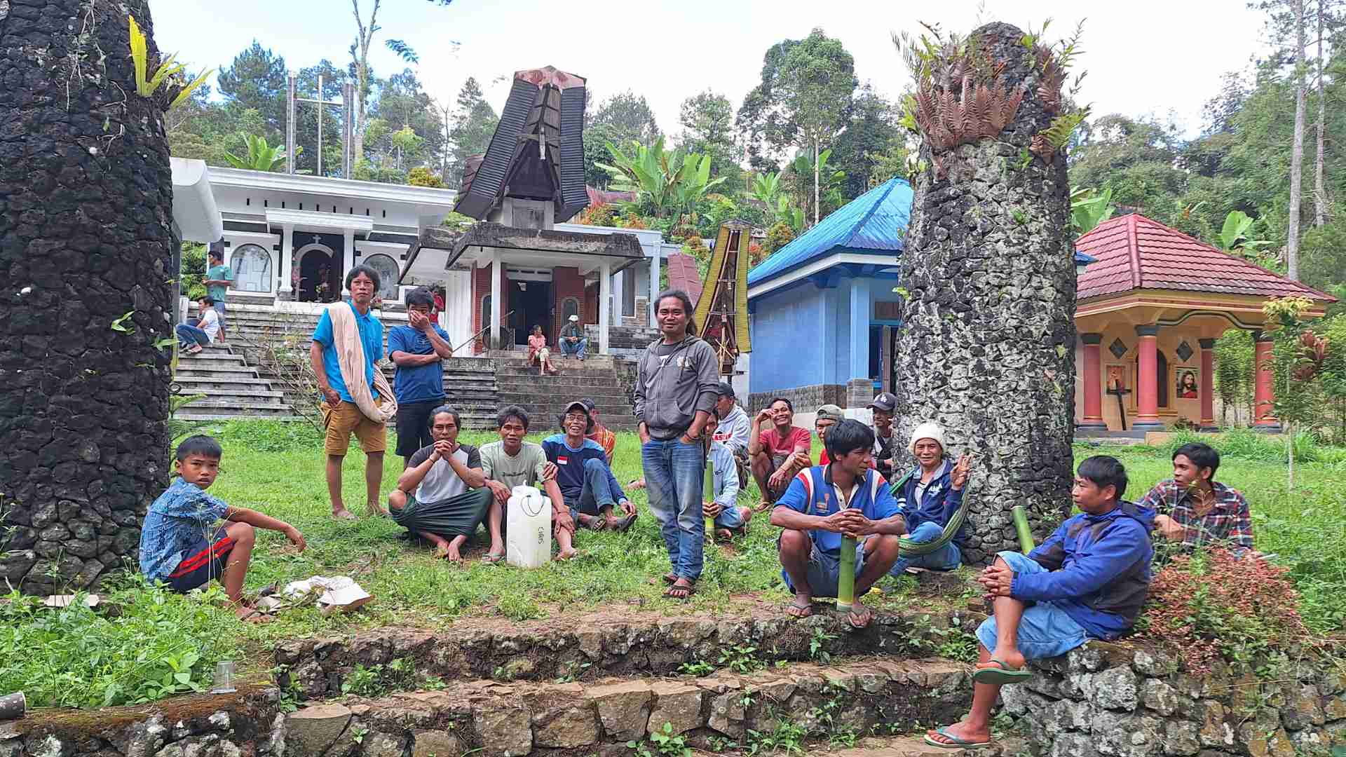 Locals relax after a Ma'Nene ritual in Lolai