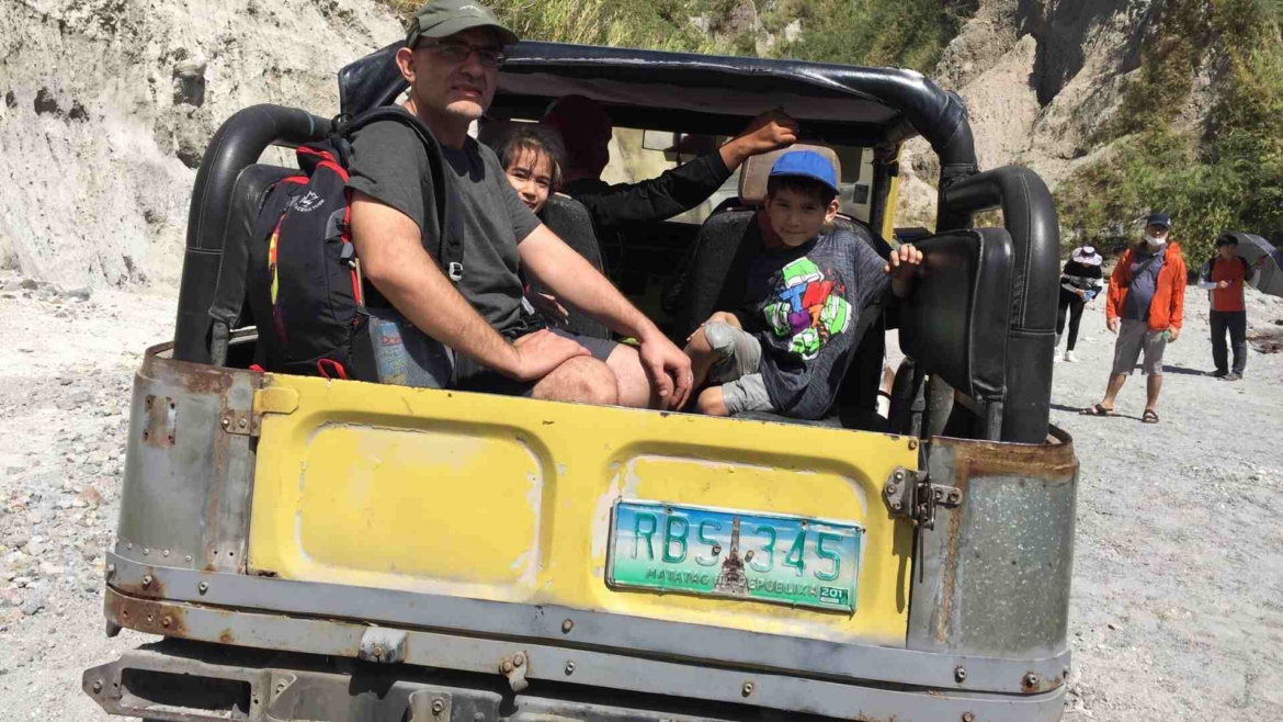 In an offroad vehicle for Mount Pinatubo trekking