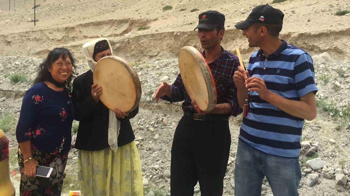 Travel on the Karakoram Highway in Xinjiang, China- dancing Pamiri Tajiks
