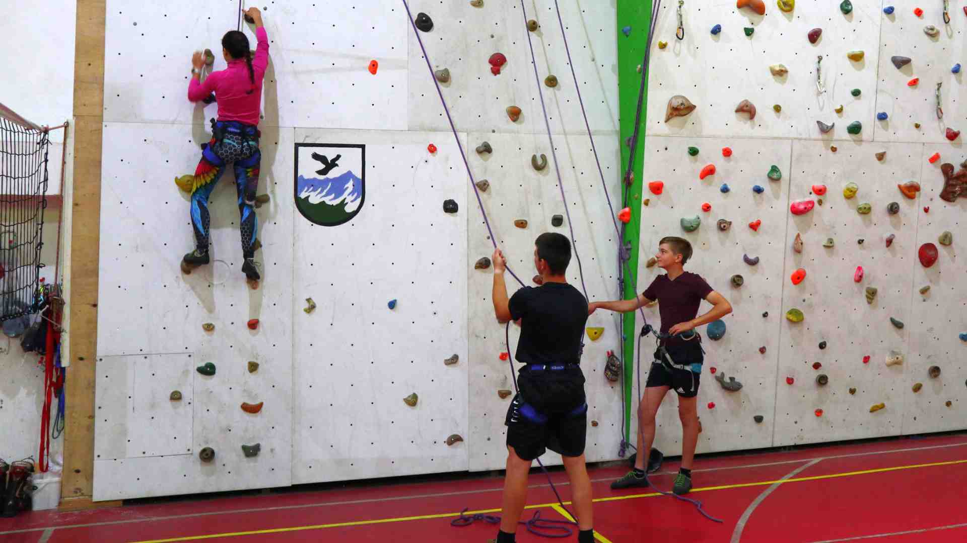 Climbing the wall in the School for Mountain Guides in Cherni Osam