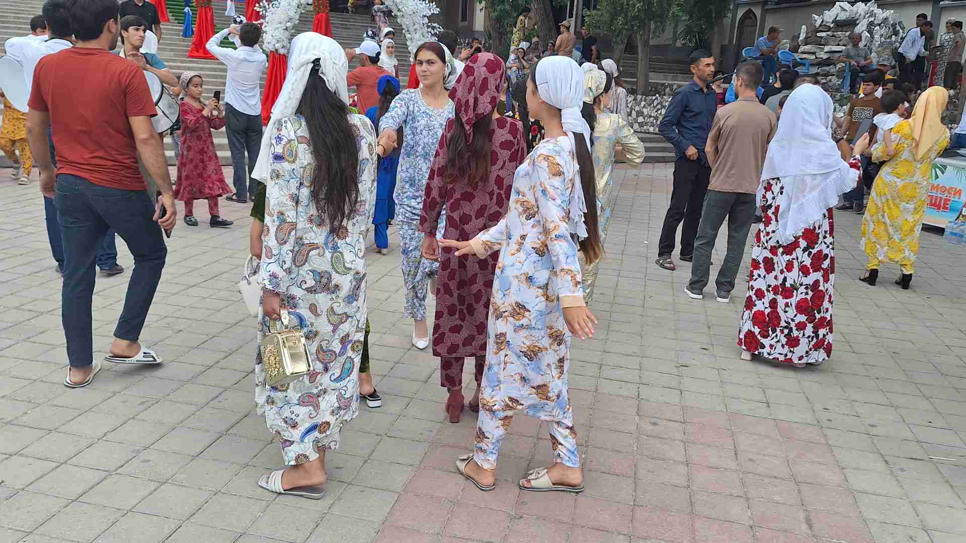 Local Tajiks dancing in the main square