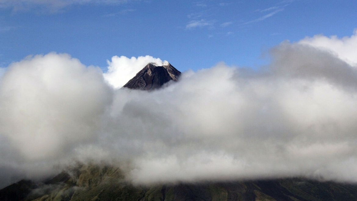 Mayon Volcano behind clouds